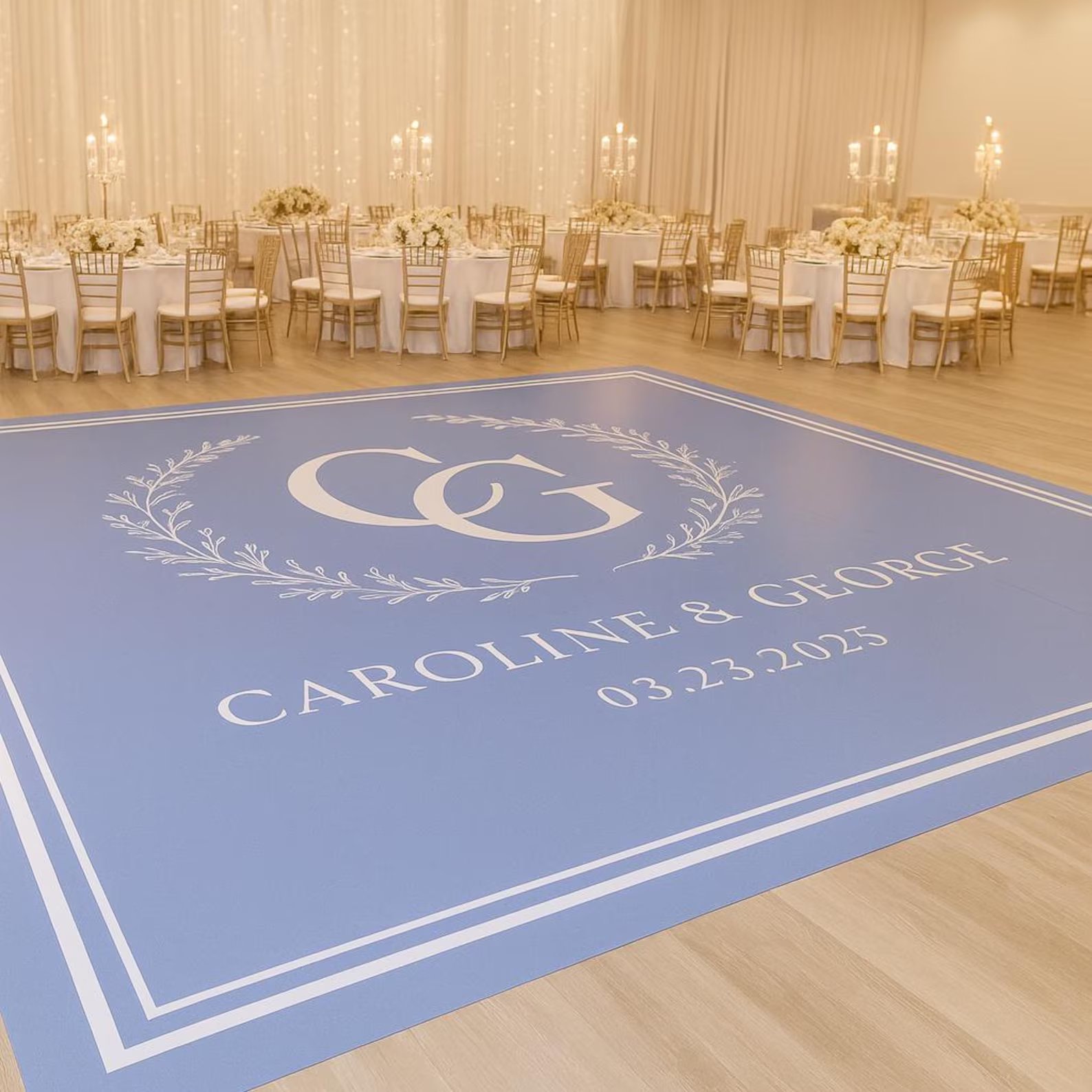 Custom printed vinyl wrap dance floor with couple's monogram and wedding date at a Portland reception